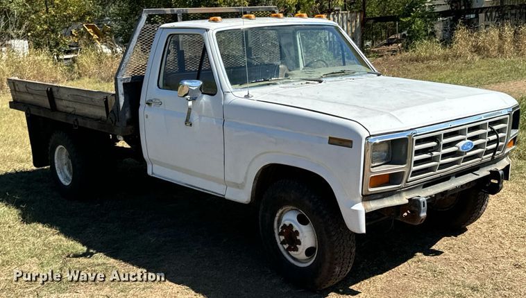 image for item DX1356 1984 Ford F350 dump flatbed pickup truck