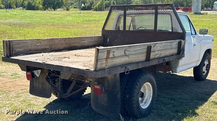 image for item DX1356 1984 Ford F350 dump flatbed pickup truck