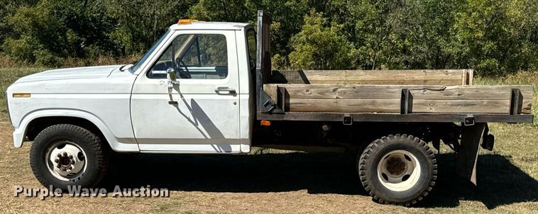 image for item DX1356 1984 Ford F350 dump flatbed pickup truck