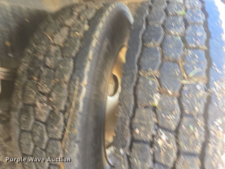 image for item EE7792 1997 Volvo WG Series  flatbed truck