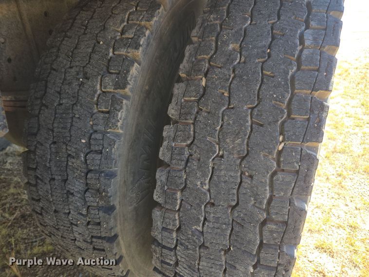 image for item EE7792 1997 Volvo WG Series  flatbed truck