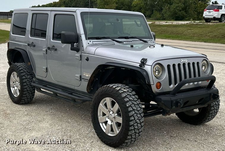 image for item EK3424 2013 Jeep Wrangler Unlimited Sahara SUV