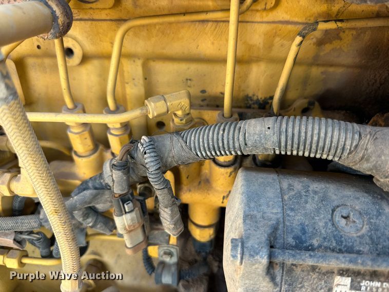 image for item DD3316 2012 John Deere 310J backhoe