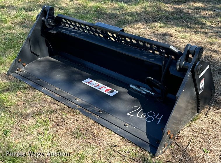 image for item DX1417 JCT Attachments skid steer four-in-one bucket
