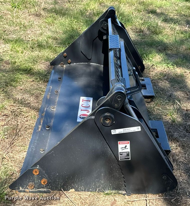 image for item DX1417 JCT Attachments skid steer four-in-one bucket