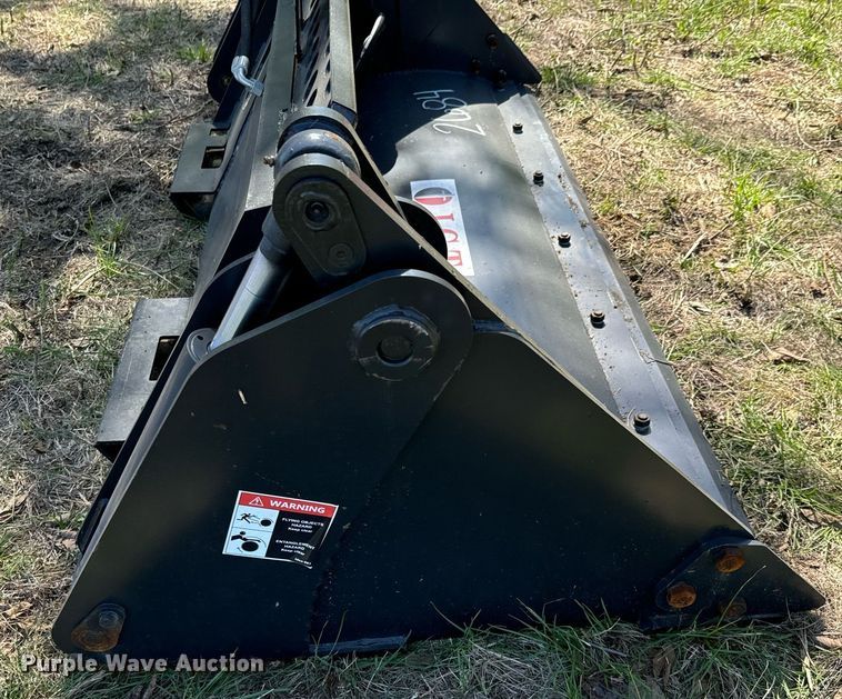 image for item DX1417 JCT Attachments skid steer four-in-one bucket