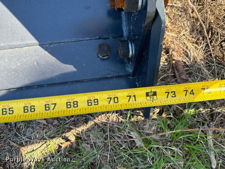 image for item DX1417 JCT Attachments skid steer four-in-one bucket