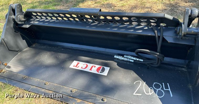 image for item DX1417 JCT Attachments skid steer four-in-one bucket