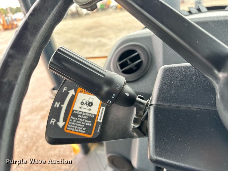 image for item EG1084 2014 John Deere  310SK backhoe