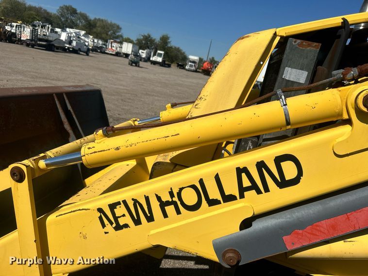 image for item EG1108 2000 New Holland 555E backhoe