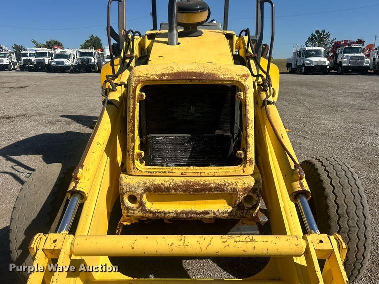 image for item EG1108 2000 New Holland 555E backhoe