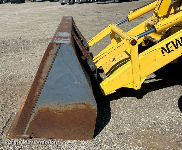 image for item EG1108 2000 New Holland 555E backhoe
