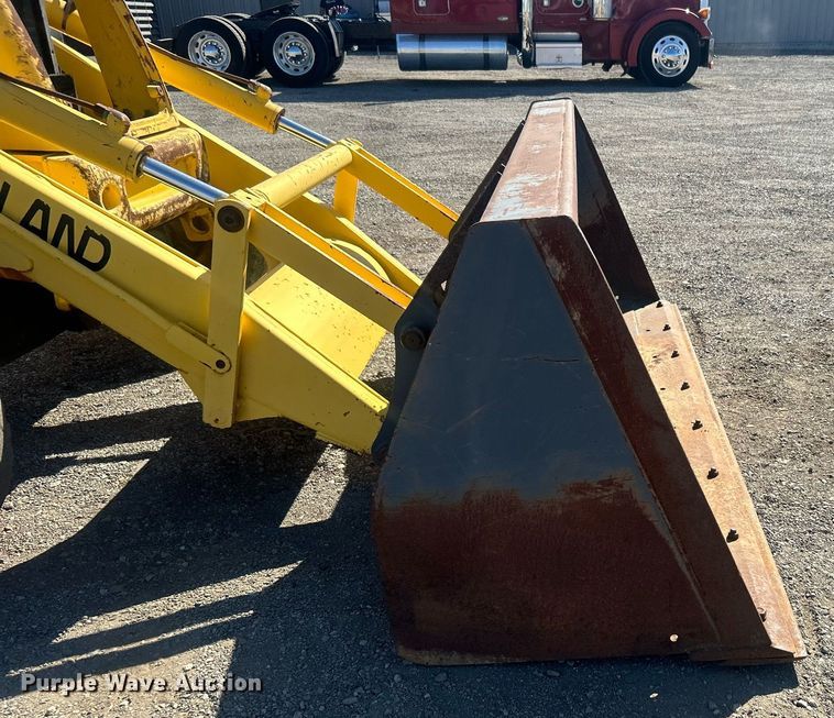 image for item EG1108 2000 New Holland 555E backhoe