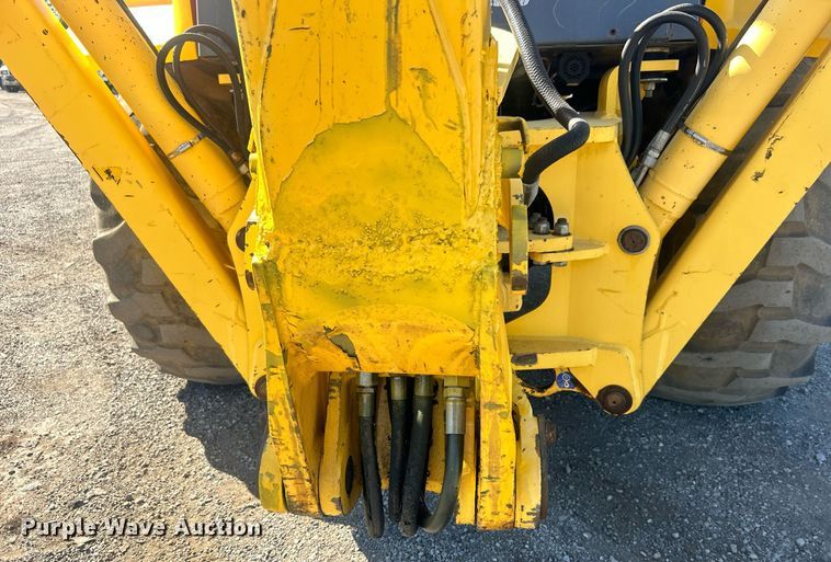 image for item EG1108 2000 New Holland 555E backhoe