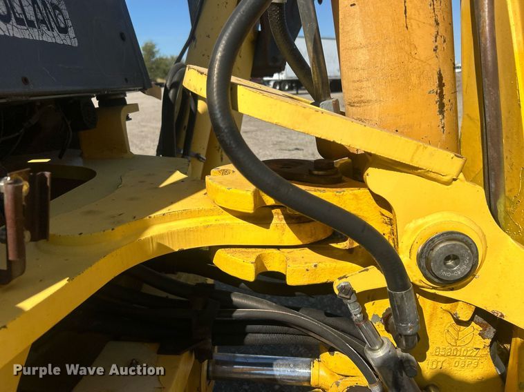 image for item EG1108 2000 New Holland 555E backhoe
