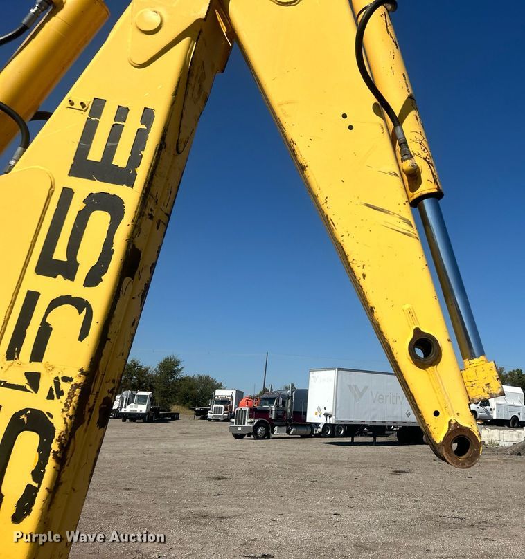 image for item EG1108 2000 New Holland 555E backhoe