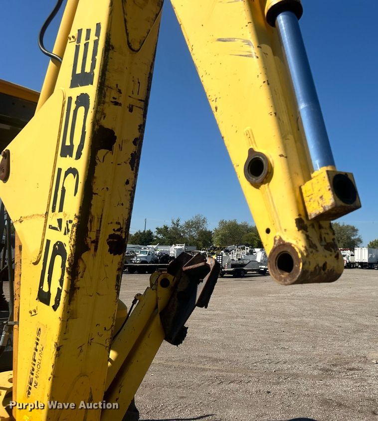 image for item EG1108 2000 New Holland 555E backhoe