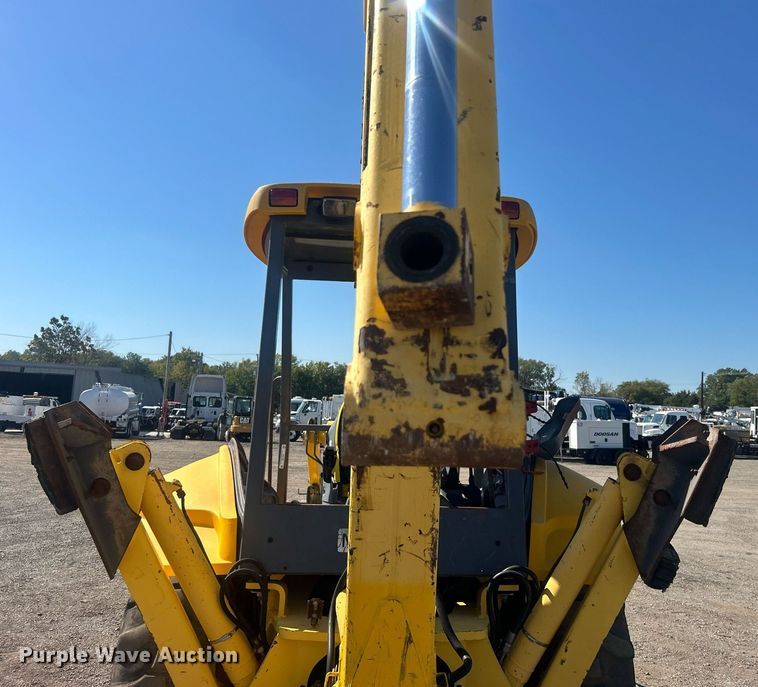 image for item EG1108 2000 New Holland 555E backhoe
