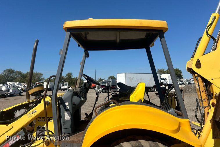 image for item EG1108 2000 New Holland 555E backhoe