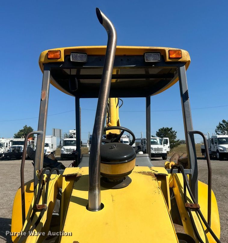 image for item EG1108 2000 New Holland 555E backhoe