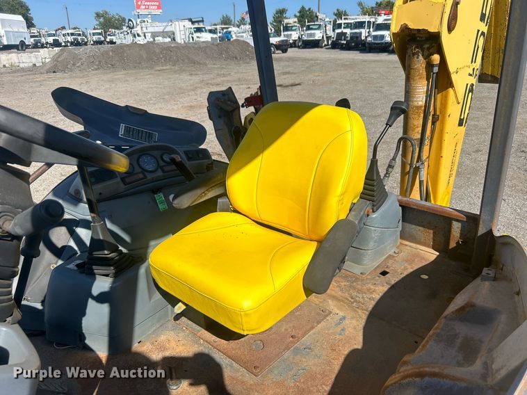 image for item EG1108 2000 New Holland 555E backhoe