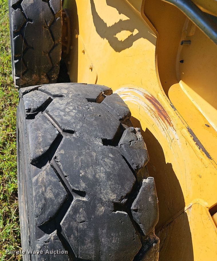 image for item EK0842 2012 John Deere  326D skid steer loader