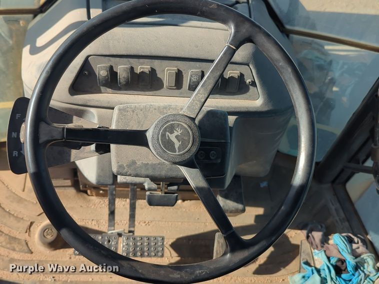 image for item EQ2263 2012 John Deere 310SJ backhoe