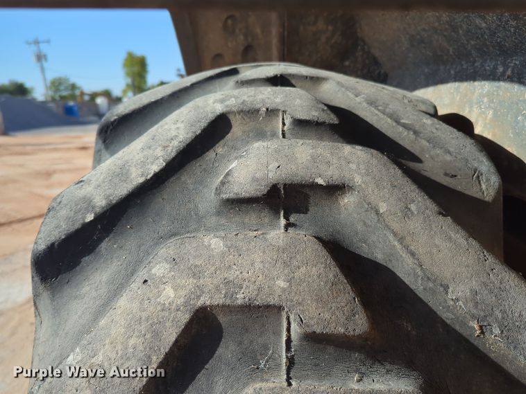 image for item EQ2263 2012 John Deere 310SJ backhoe