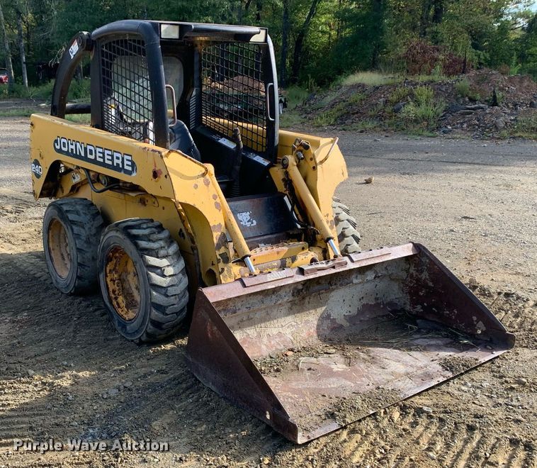 image for item JT9750 1999 John Deere  240 skid steer loader