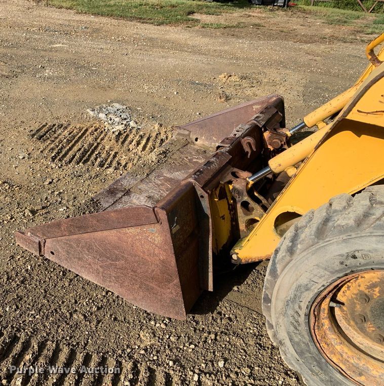 image for item JT9750 1999 John Deere  240 skid steer loader