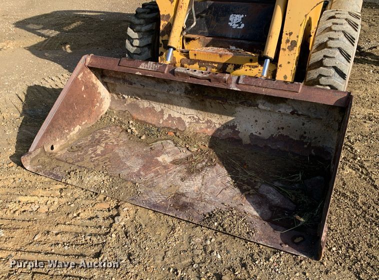 image for item JT9750 1999 John Deere  240 skid steer loader