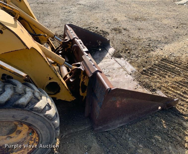 image for item JT9750 1999 John Deere  240 skid steer loader