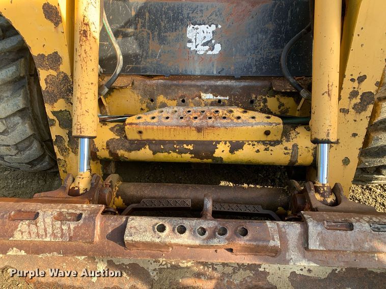 image for item JT9750 1999 John Deere  240 skid steer loader