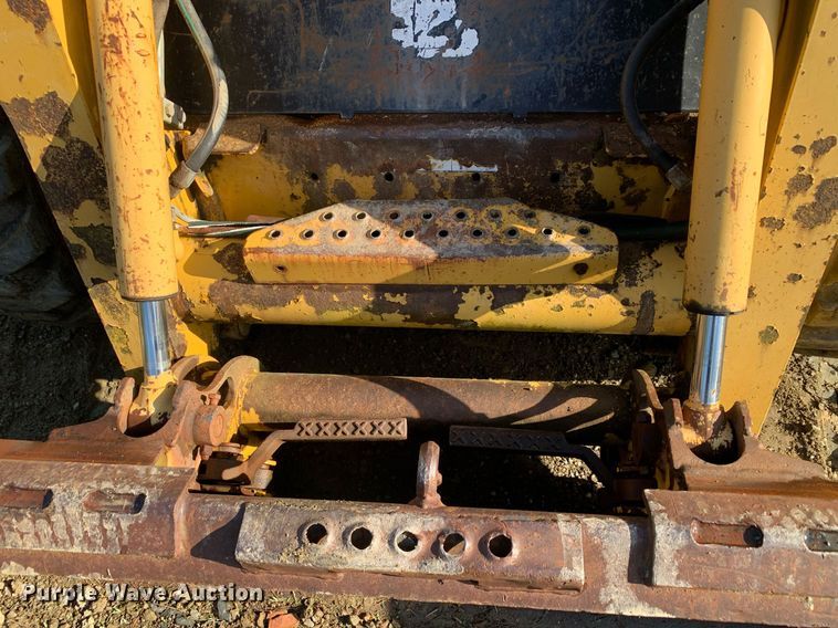 image for item JT9750 1999 John Deere  240 skid steer loader