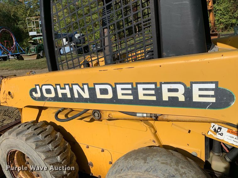 image for item JT9750 1999 John Deere  240 skid steer loader