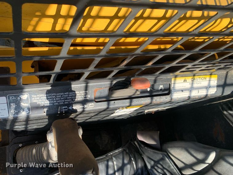 image for item JT9750 1999 John Deere  240 skid steer loader