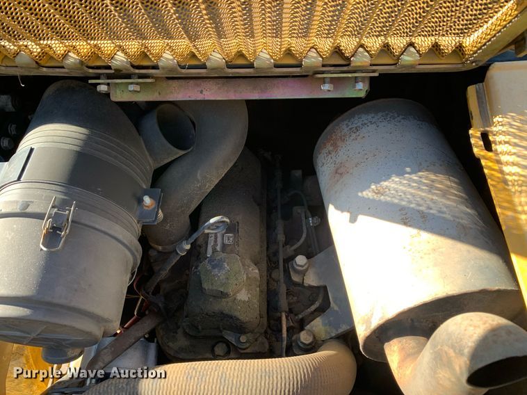 image for item JT9750 1999 John Deere  240 skid steer loader