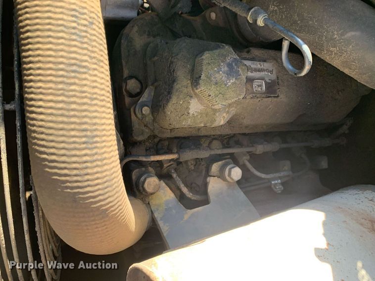 image for item JT9750 1999 John Deere  240 skid steer loader