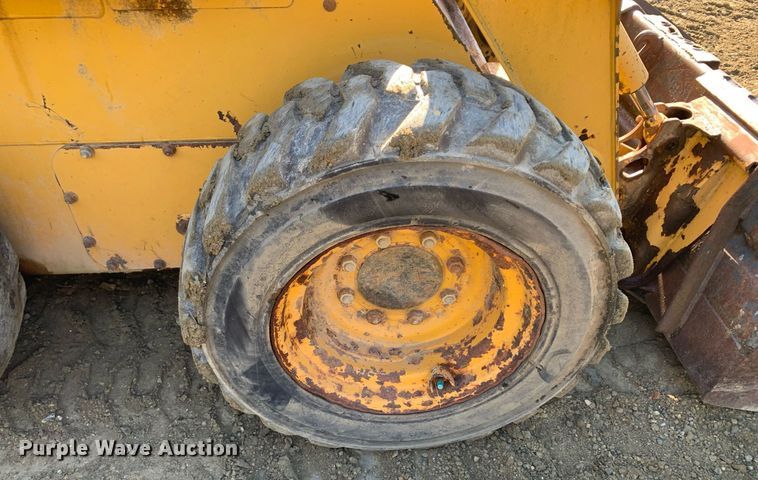 image for item JT9750 1999 John Deere  240 skid steer loader