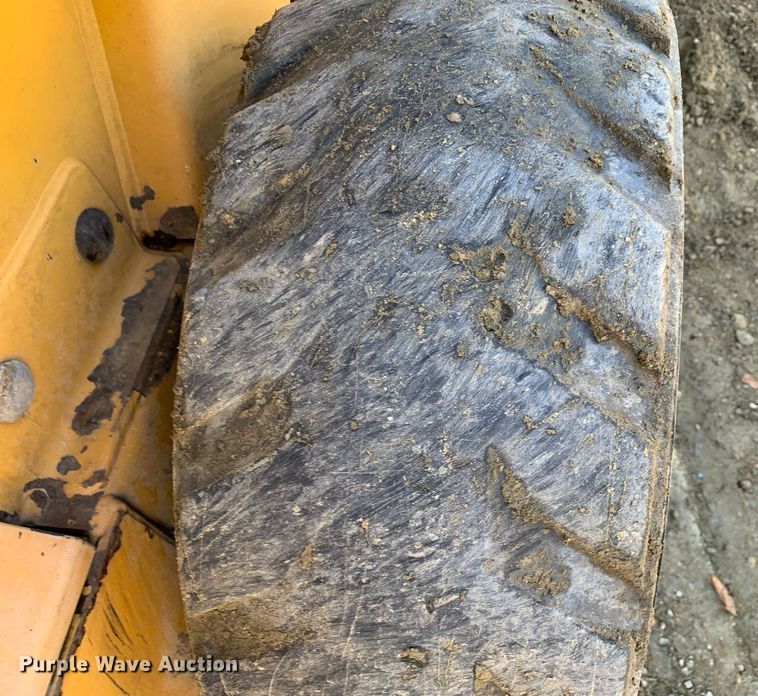 image for item JT9750 1999 John Deere  240 skid steer loader