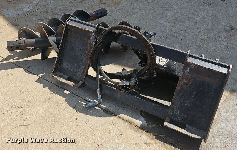 image for item NX9293 Kubota  SA20 skid steer auger