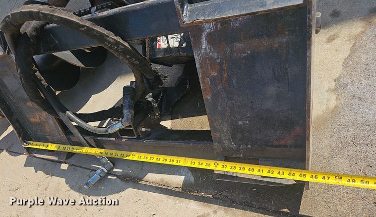 image for item NX9293 Kubota  SA20 skid steer auger