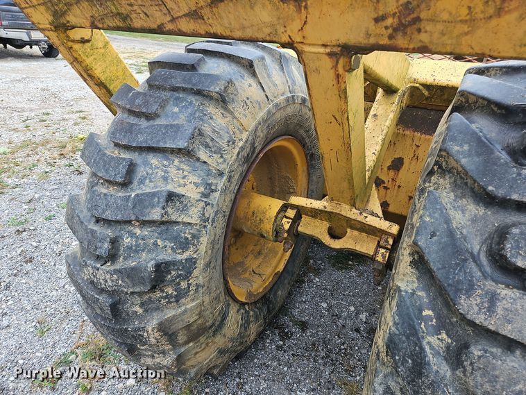 image for item OJ9869 2000 John Deere 1812C scraper