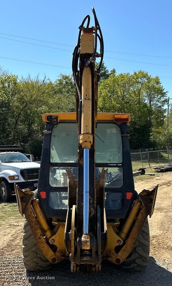 image for item EJ4879 1998 John Deere 310SE backhoe