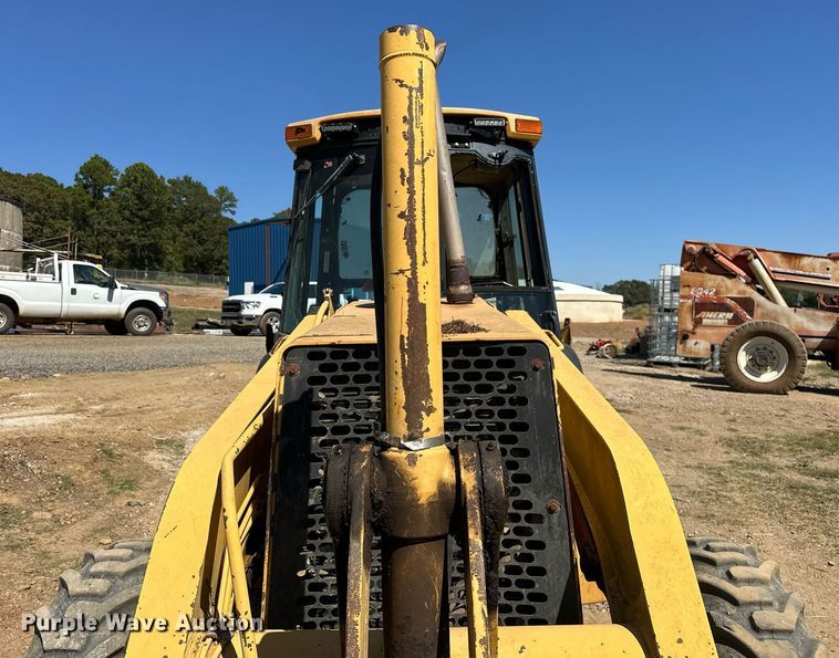 image for item EJ4879 1998 John Deere 310SE backhoe