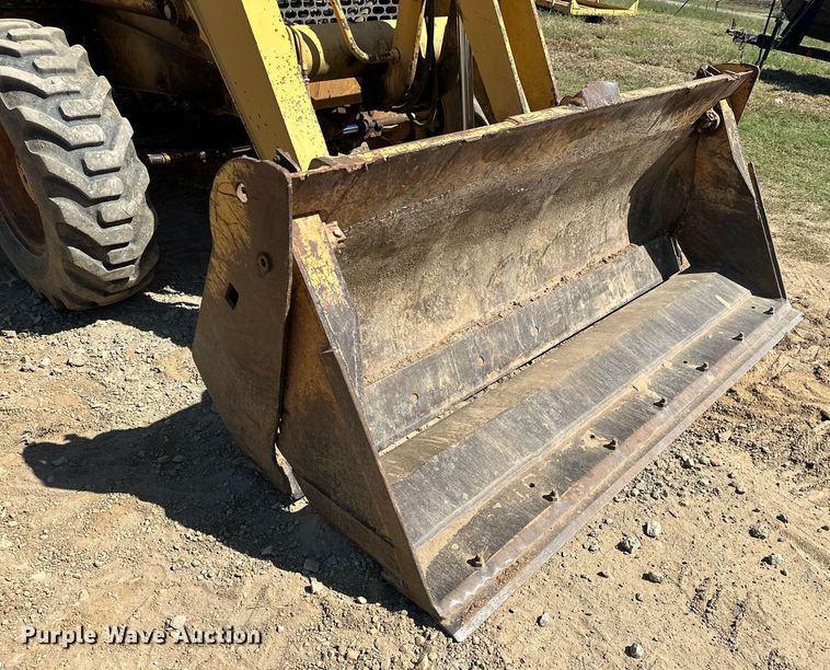 image for item EJ4879 1998 John Deere 310SE backhoe