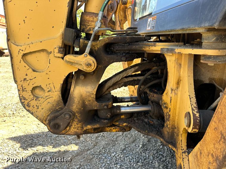 image for item EJ4879 1998 John Deere 310SE backhoe