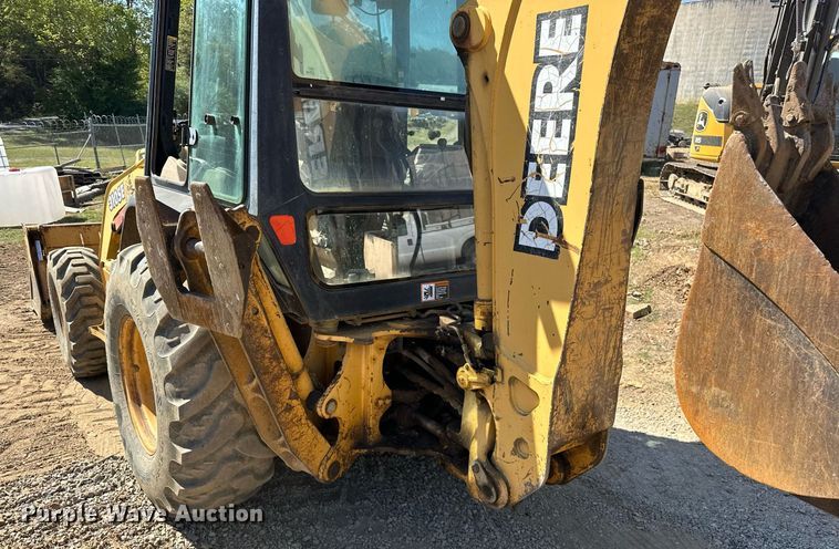 image for item EJ4879 1998 John Deere 310SE backhoe