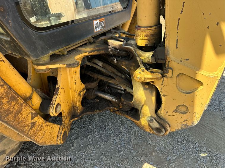 image for item EJ4879 1998 John Deere 310SE backhoe