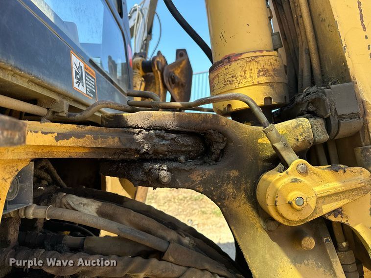 image for item EJ4879 1998 John Deere 310SE backhoe